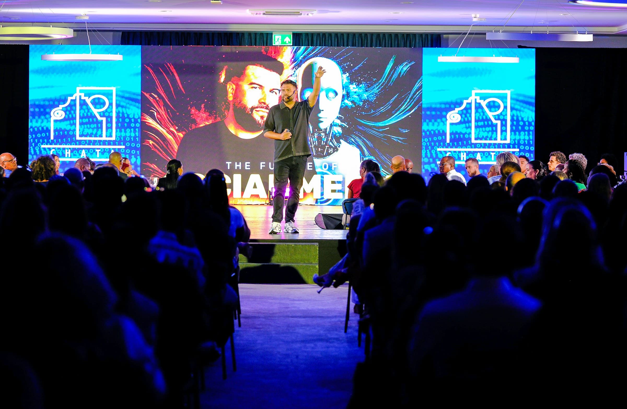 A keynote speaker presenting research on stage